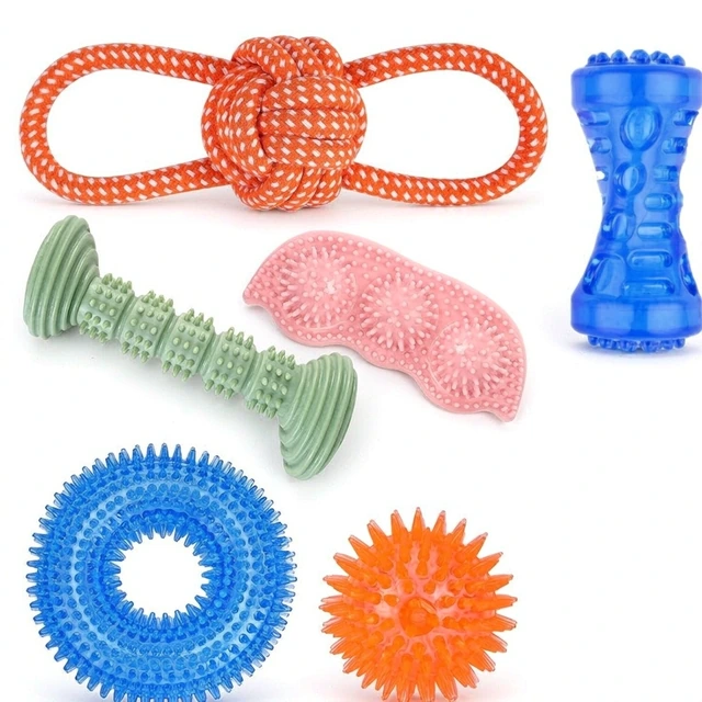 Studio packshot of a six piece dog toy set with rubber chew toys and rope tug - six piece dog toy set with rubber chew toys and a knotted rope tug - dog toys wholesale supplier