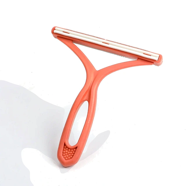 Studio packshot of a double sided dog hair remover scraper - double sided dog hair remover scraper for sofas and carpets - dog hair remover wholesale supplier